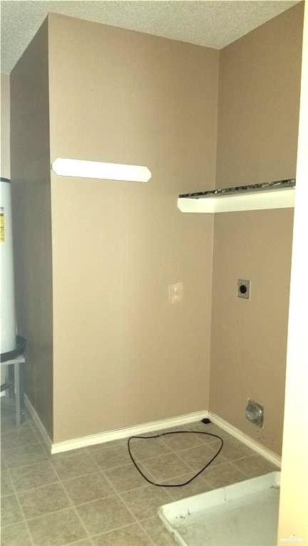 2104 Magnolia Street Mission, TX 78573 - Photo 11 of 13 a bathroom with a shower