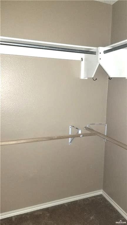 2104 Magnolia Street Mission, TX 78573 - Photo 9 of 13 a view of a room with racks on the wall