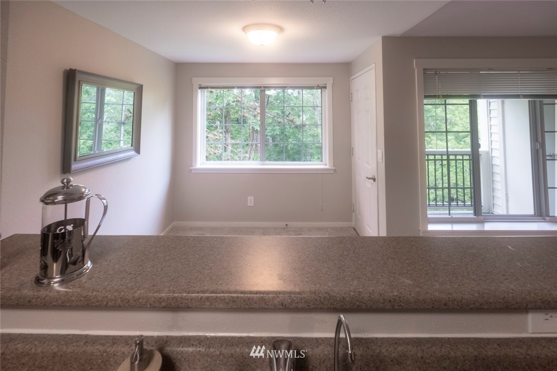 12404 East Gibson Road, Unit F303 Everett, WA 98204 - Photo 6 of 23 a view of a living room and a window