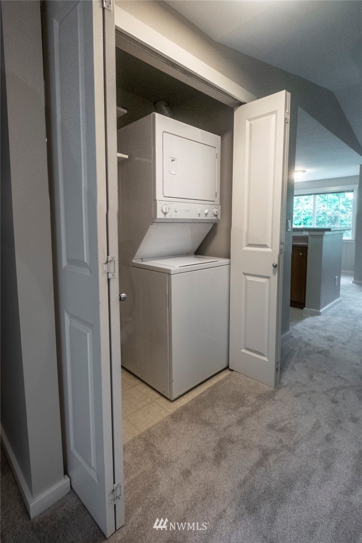 12404 East Gibson Road, Unit F303 Everett, WA 98204 - Photo 9 of 23 a utility room with dryer and washer