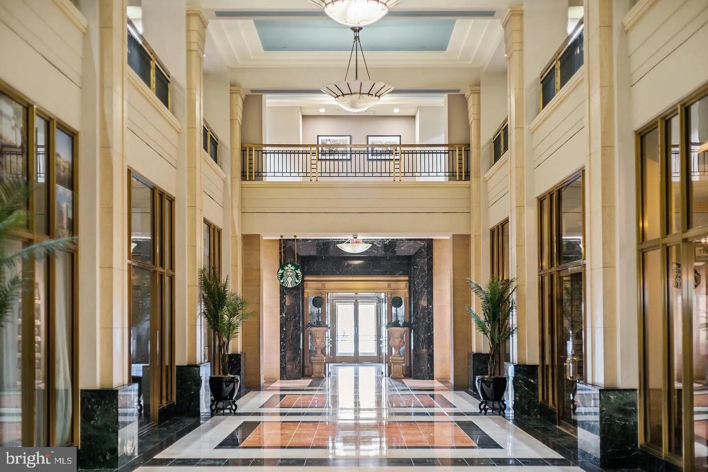 1600-18 Arch Street, Unit 1410 Philadelphia, PA 19103 - Photo 17 of 25 a view of an entryway with a chandelier