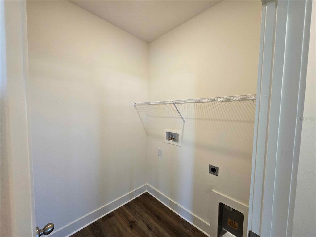3819 Daybreak Run Loop Spring Hill, FL 34609 - Photo 6 of 15 a small space with wooden floor and a window