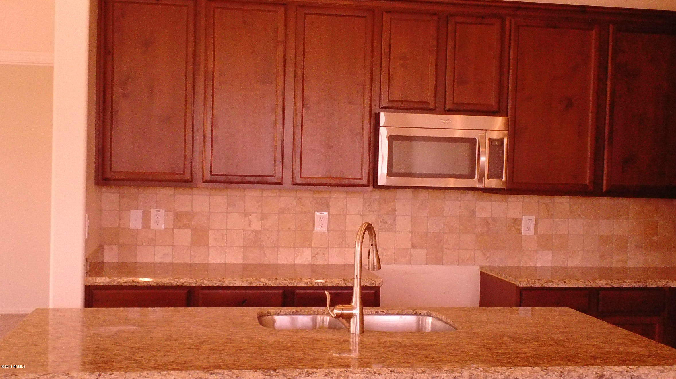 3115 East Rochelle Street Mesa, AZ 85213 - Photo 11 of 14 Alder Wood 42' Cabinets/ Tumbled Stone