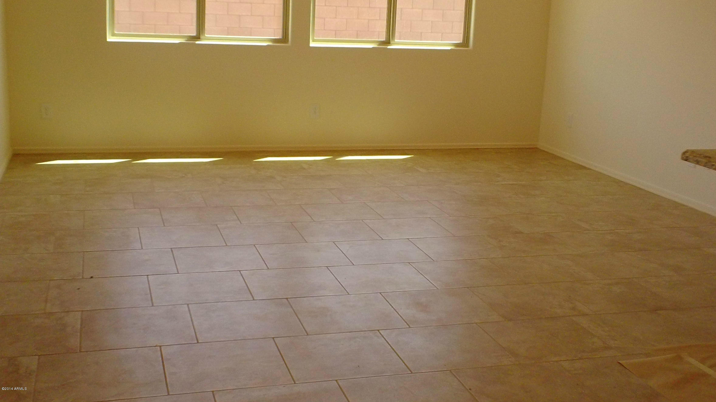3115 East Rochelle Street Mesa, AZ 85213 - Photo 14 of 14 Beautifully Tiled Family Room