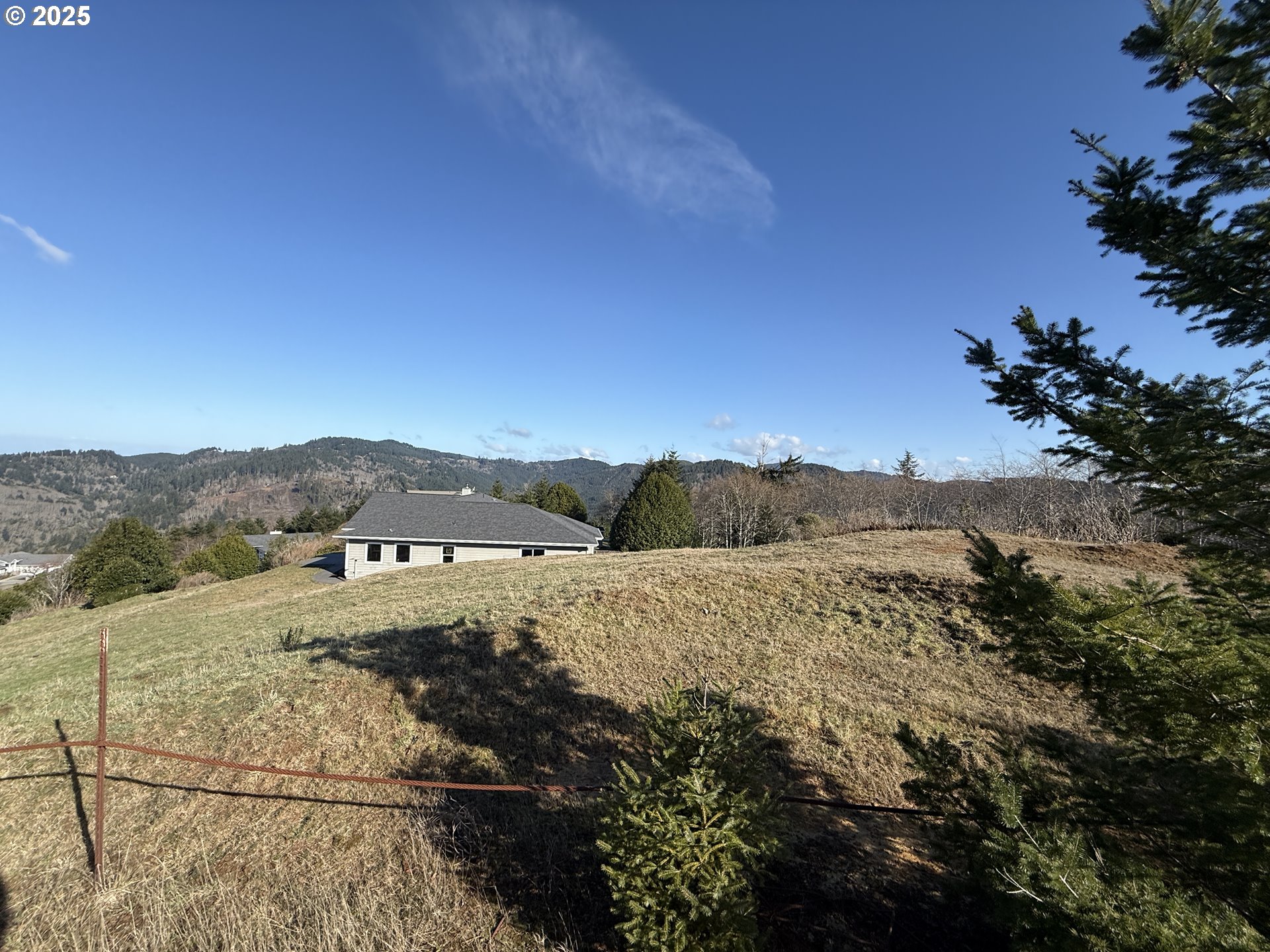 Dale Court Brookings, OR 97415 - Photo 13 of 25 a view of an lake and mountain
