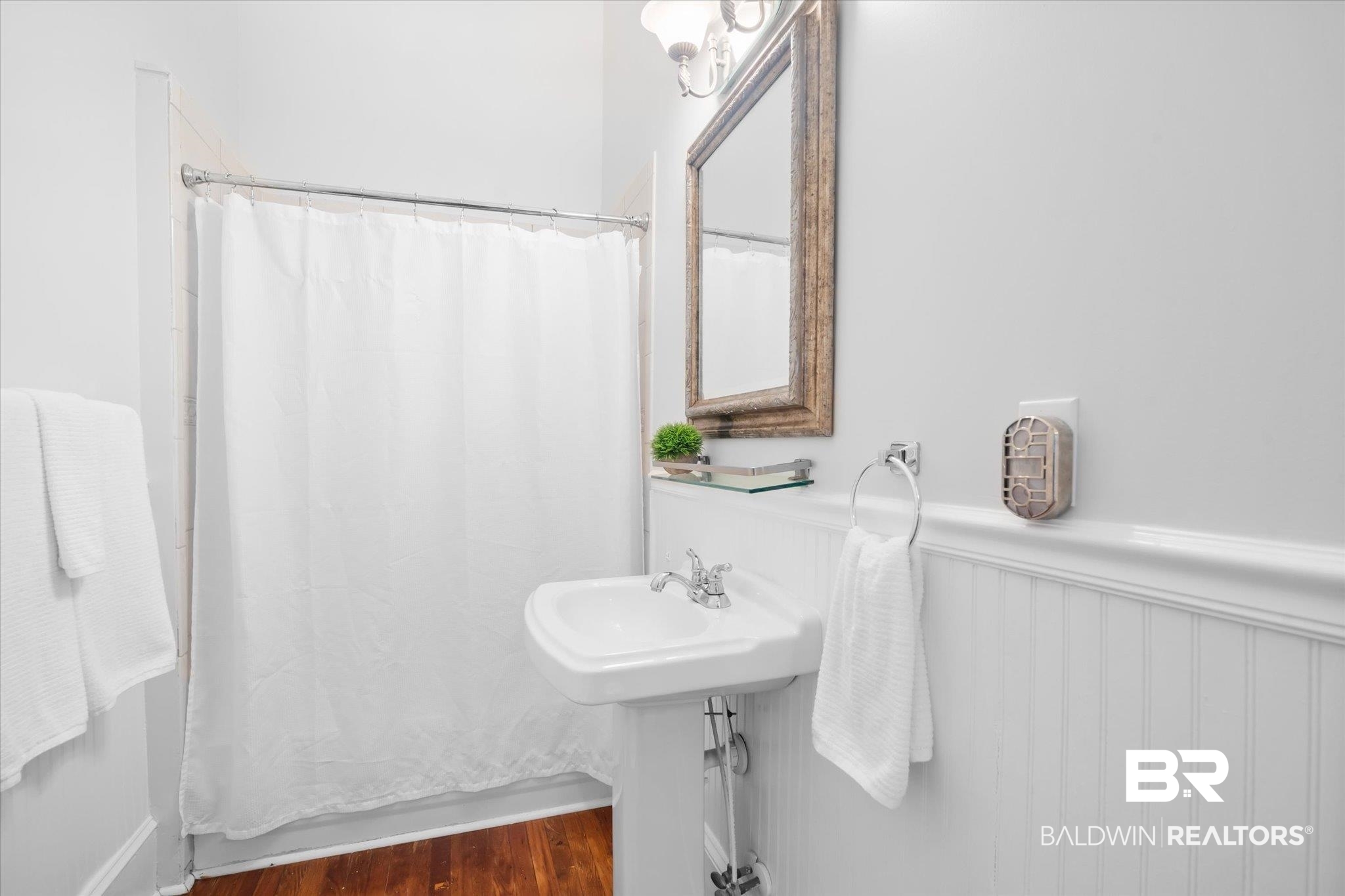 14 South Monterey Street Mobile, AL 36604 - Photo 15 of 41 Bathroom featuring hardwood / wood-style floors