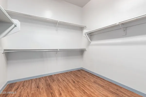 a view of a room with toys and wooden floor