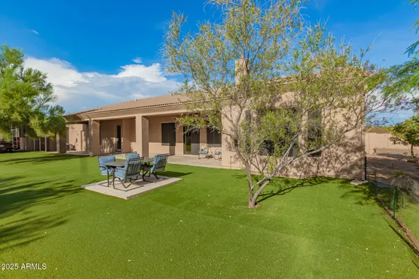 a view of a backyard of a house