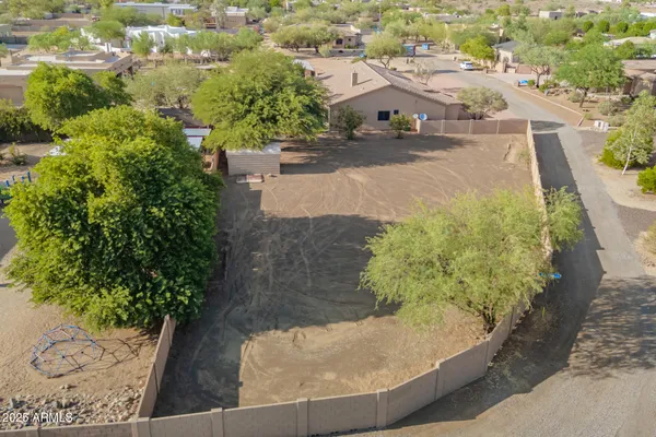 an aerial view of residential building and green space