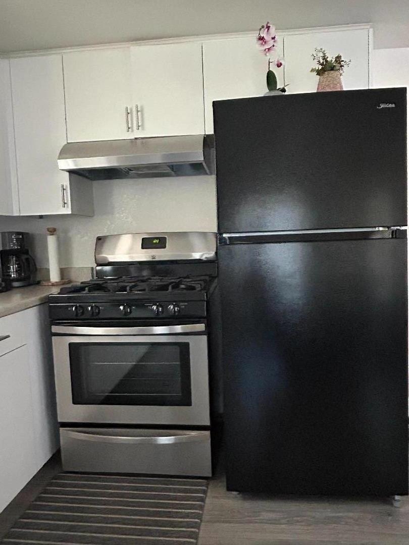 756 1st Street Gilroy, CA 95020 - Photo 9 of 14 a close view of a stove in a kitchen
