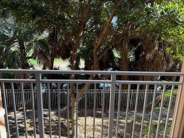 a view of an empty room and a window