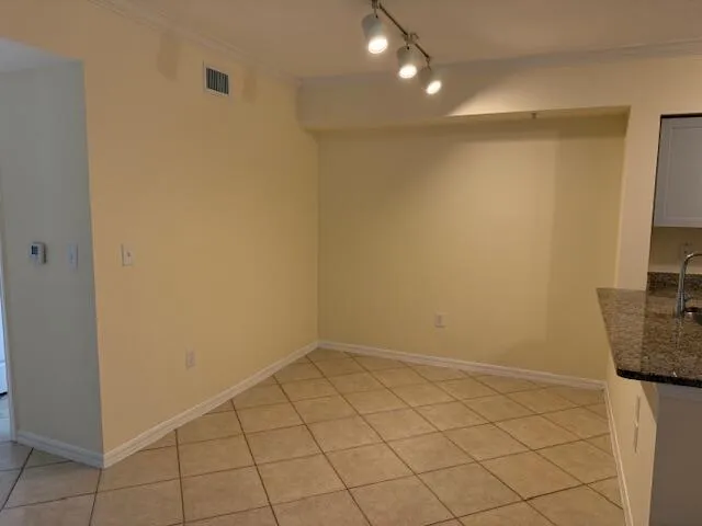 a bathroom with a double vanity sink and mirror