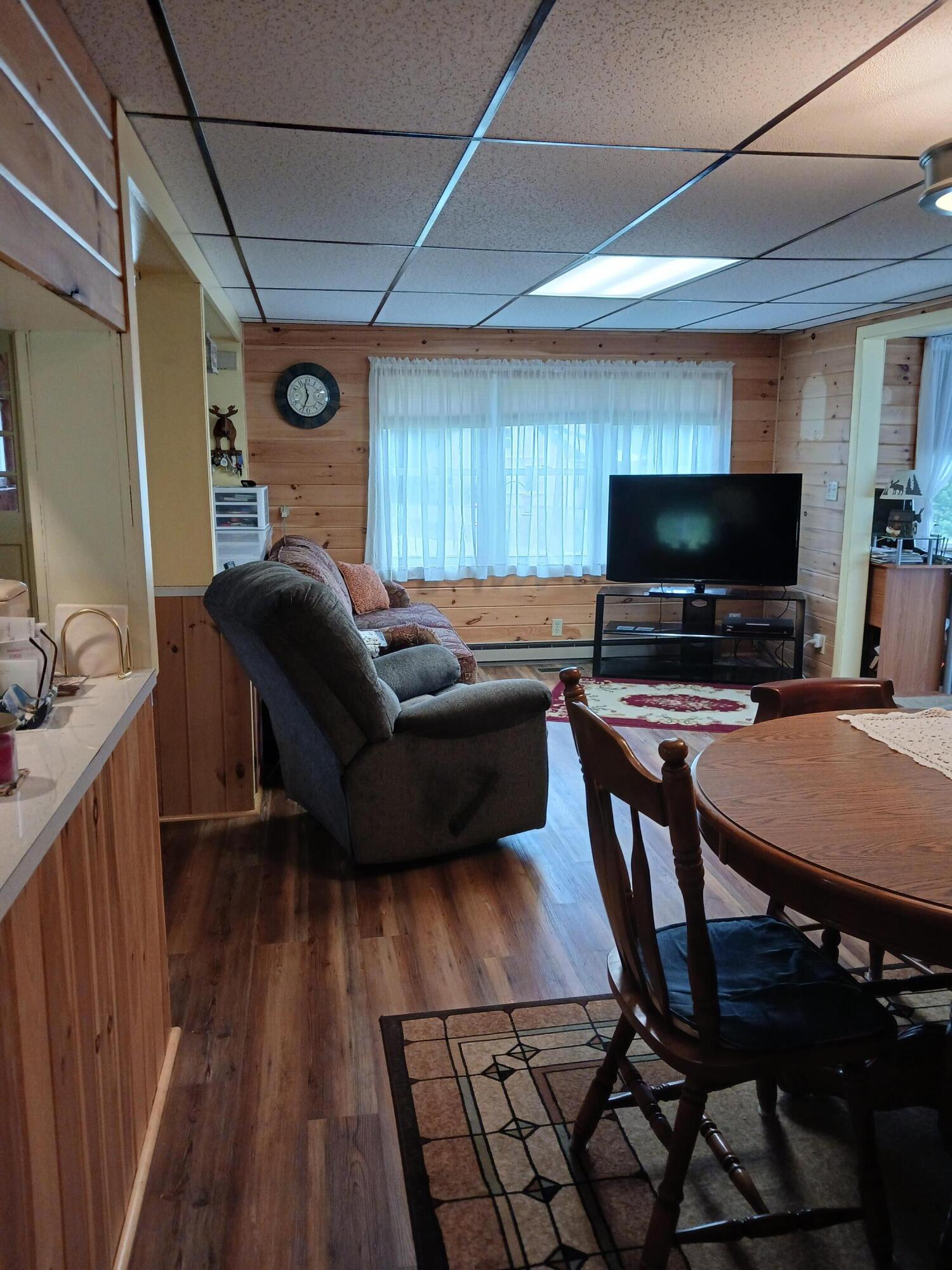 2296 Long Falls Dam Road New Portland, ME 04961 - Photo 14 of 25 Dining to living room