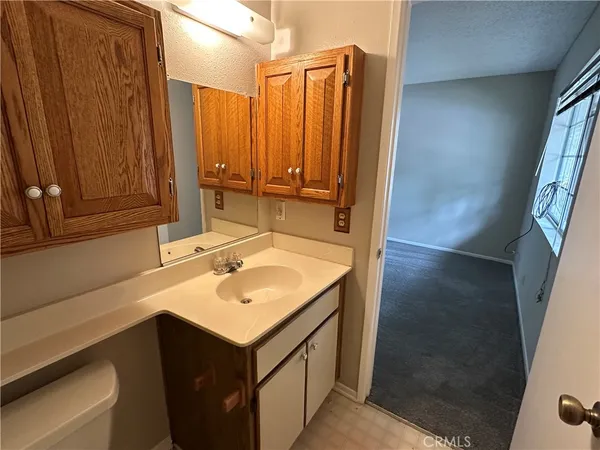 a view of balcony with deck and outdoor seating