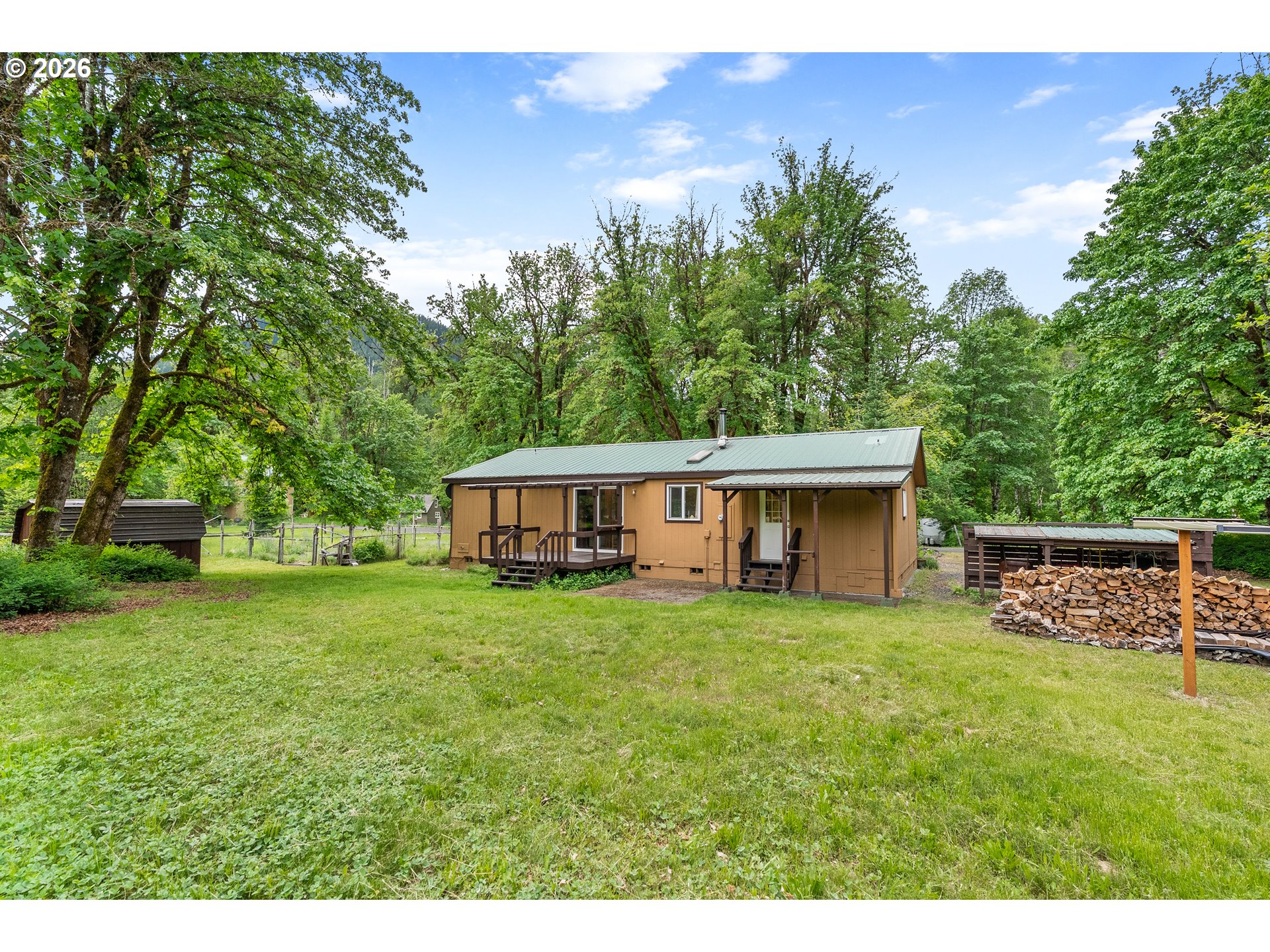 451 Cannavinna Road Carson, WA 98610 - Photo 24 of 33 a house view with a garden space
