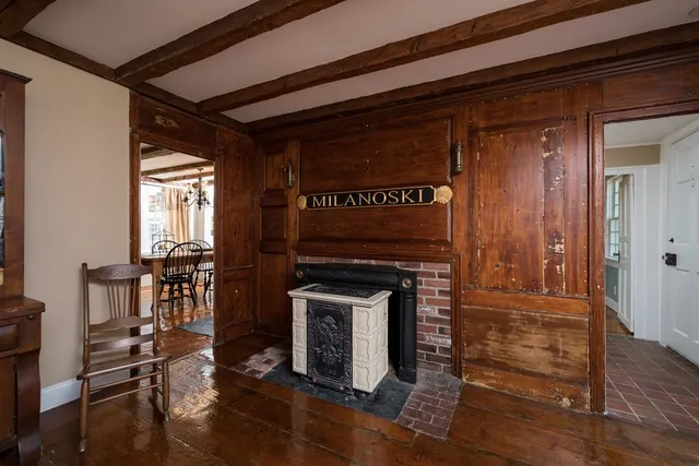 a kitchen with a stove and a refrigerator