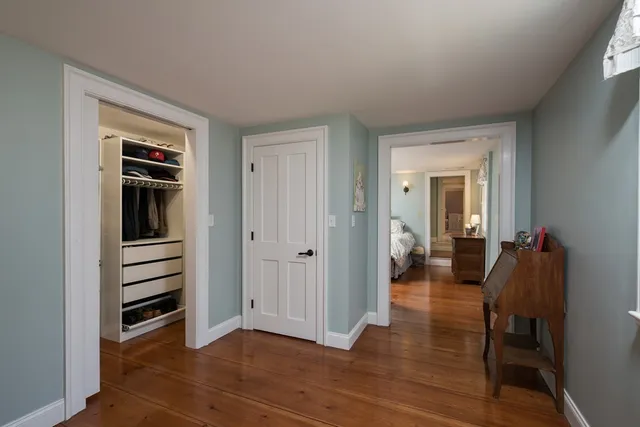 a view of a livingroom with furniture and wooden floor