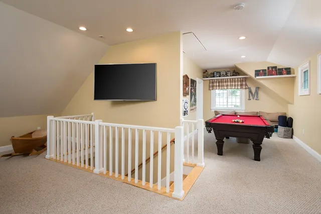 a room with furniture and a flat screen tv