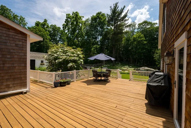 swimming pool view with a seating space