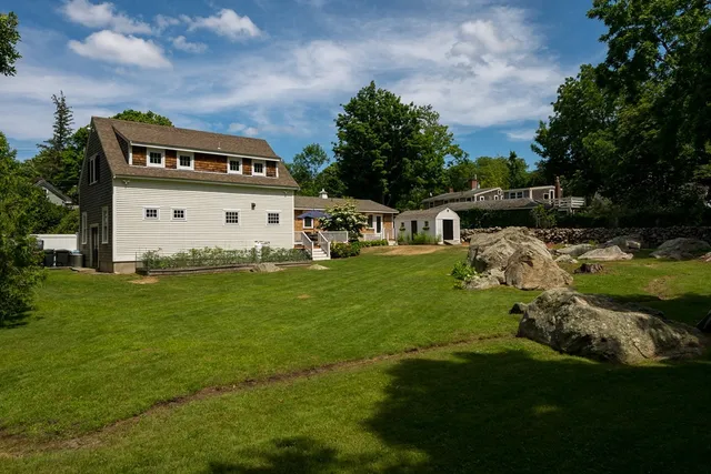 a front view of house with garden