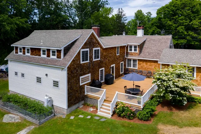 aerial view of a house with garden