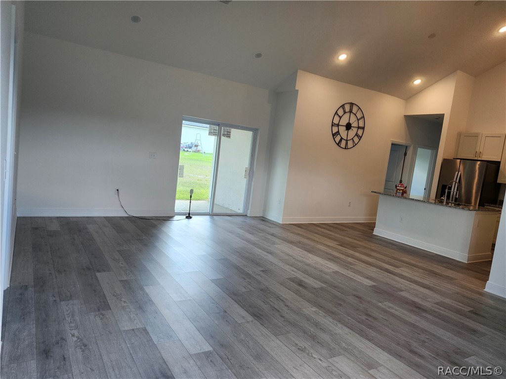 2800 Southwest 139th Street Ocala, FL 34473 - Photo 3 of 16 a view of an empty room and wooden floor