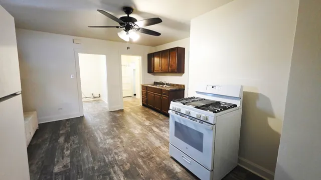 a kitchen with a stove and a microwave