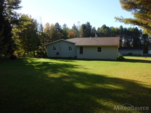 8050 Logana Road Avoca, MI 48006 - Photo 12 of 30 This is a view of the side of the home.