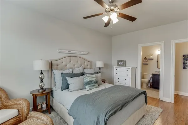 a view of hall way with furniture and a window