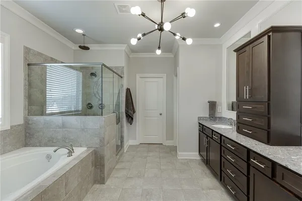 a balcony with furniture and a ceiling fan