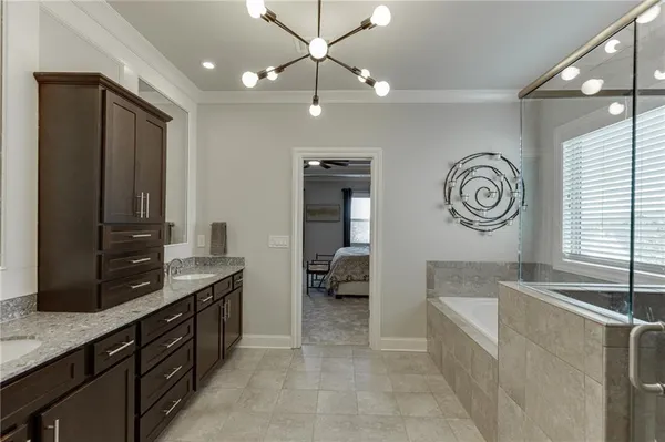 a view of a house with yard and sitting area