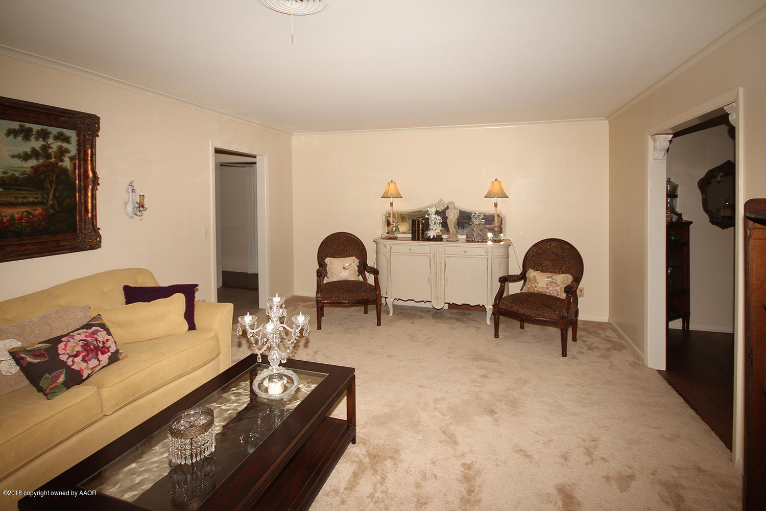 6311 Elmhurst Road Amarillo, TX 79106 - Photo 5 of 38 a living room with furniture and a flat screen tv