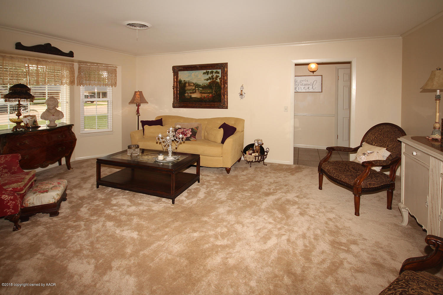 6311 Elmhurst Road Amarillo, TX 79106 - Photo 6 of 38 a living room with furniture and a window
