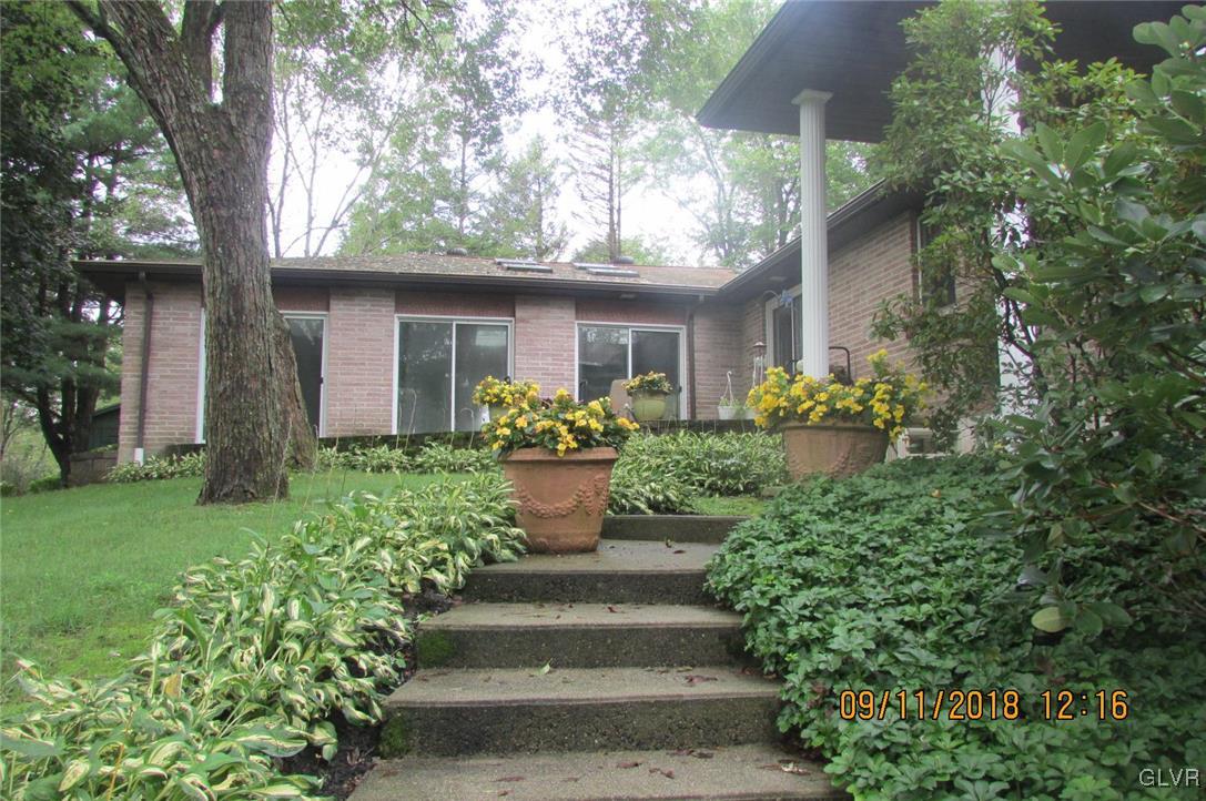 6080 Little Gap Road Kunkletown, PA 18058 - Photo 2 of 43 a front view of a house with a yard