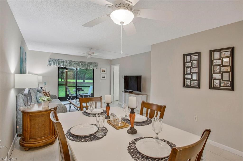 4258 27th Court Southwest, Unit 106 Naples, FL 34116 - Photo 9 of 19 Dining with a view