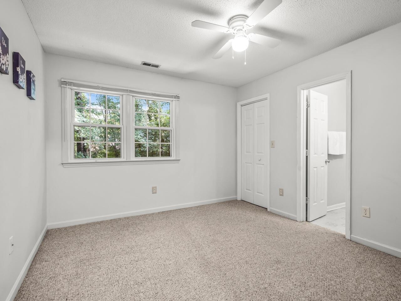 118 Shady Spring Place Durham, NC 27713 - Photo 18 of 33 a view of an empty room with a window