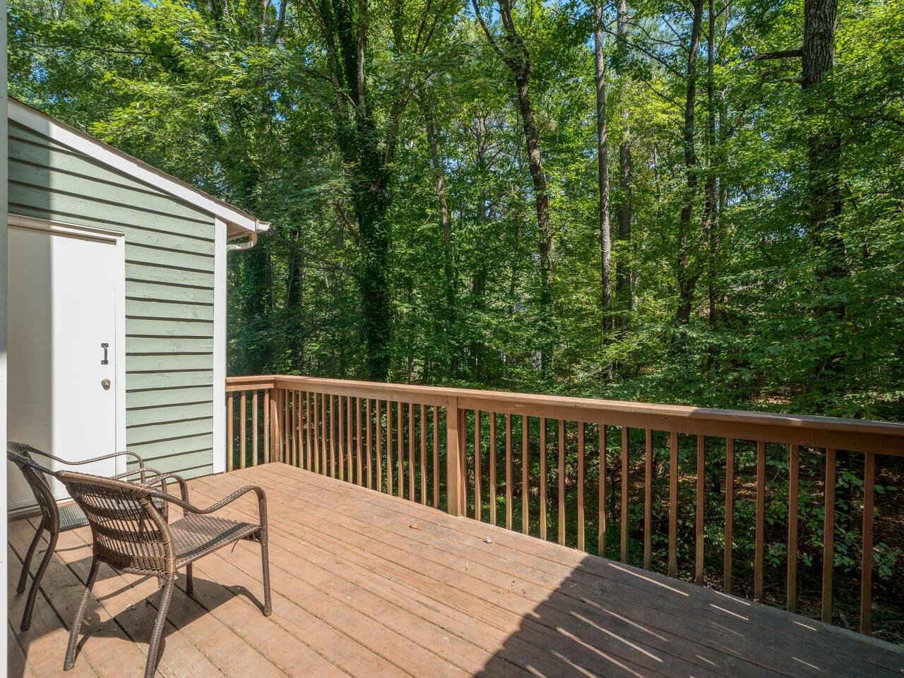 118 Shady Spring Place Durham, NC 27713 - Photo 26 of 33 a balcony with wooden floor and fence