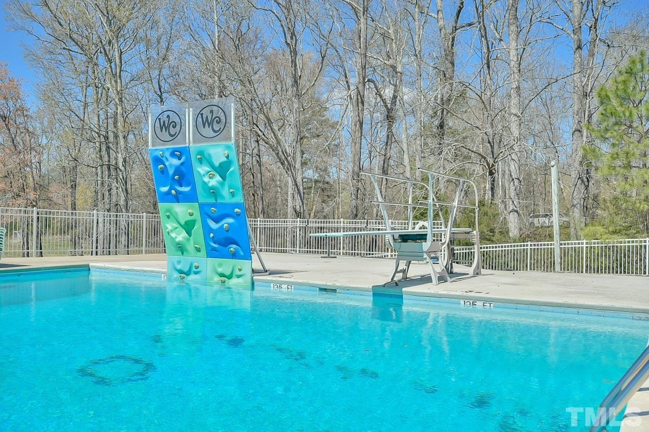 118 Shady Spring Place Durham, NC 27713 - Photo 31 of 33 a view of outdoor space with a garden and entertaining space