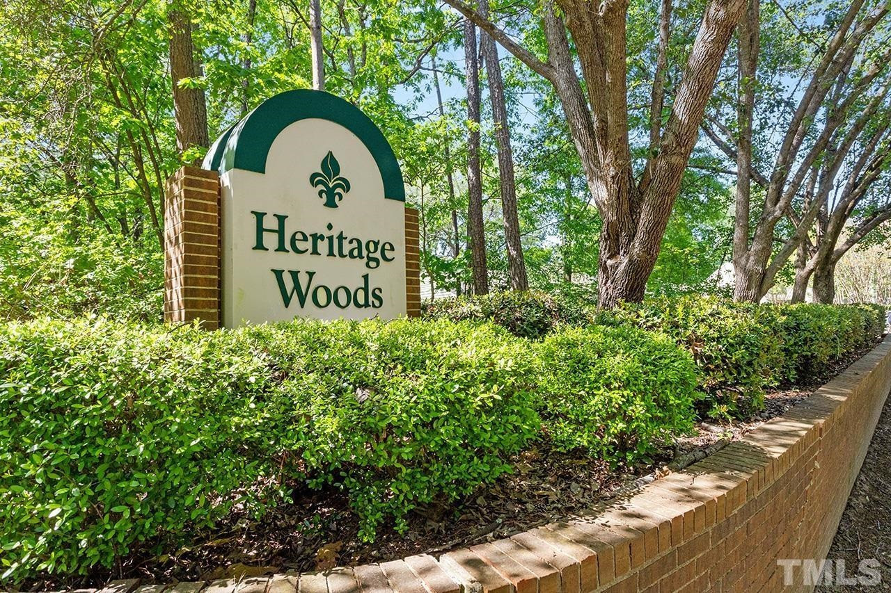118 Shady Spring Place Durham, NC 27713 - Photo 33 of 33 a sign of golf club on a wall under a large tree