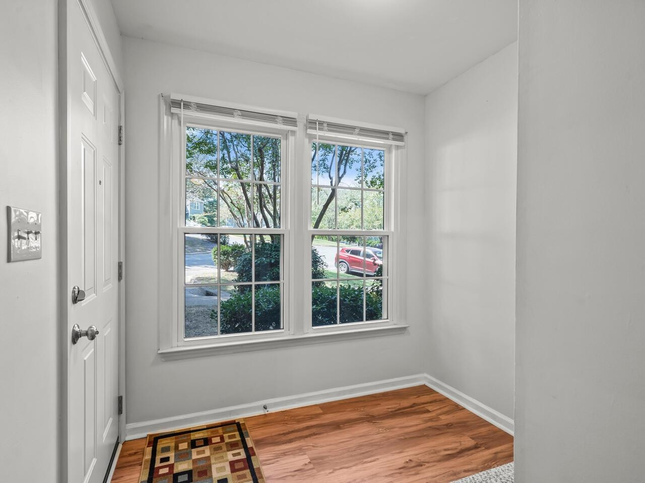 118 Shady Spring Place Durham, NC 27713 - Photo 4 of 33 a view of a room that has a window in it