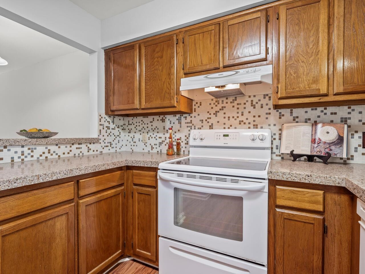 118 Shady Spring Place Durham, NC 27713 - Photo 6 of 33 a kitchen with granite countertop cabinets stainless steel appliances and sink