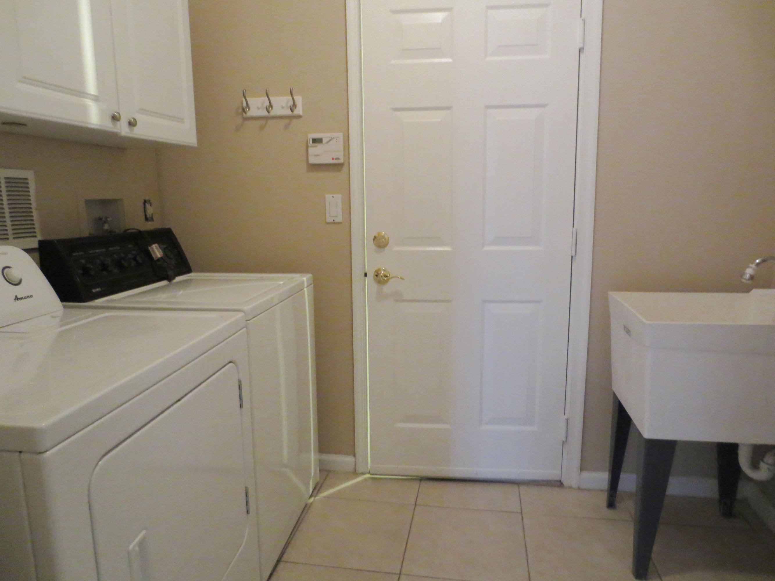 1307 Pebble Ridge Lane West Palm Beach, FL 33411 - Photo 26 of 40 LAUNDRY ROOM