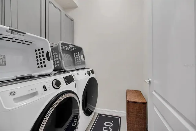 a view of a backyard with a swimming pool