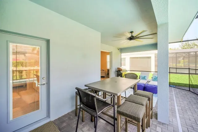 a view of swimming pool with outdoor seating