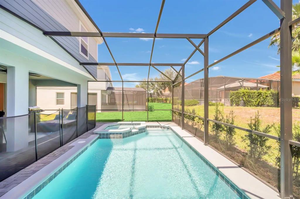 7263 Oakmoss Loop Davenport, FL 33837 - Photo 49 of 57 a building with glass door