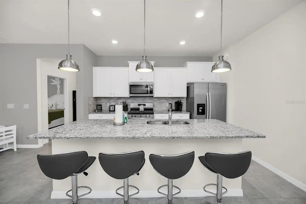 7263 Oakmoss Loop Davenport, FL 33837 - Photo 9 of 57