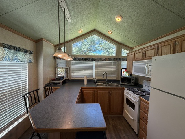 2795 East 28th Road Marseilles, IL 61341 - Photo 21 of 75 a kitchen that has a table chairs in it and wooden floors