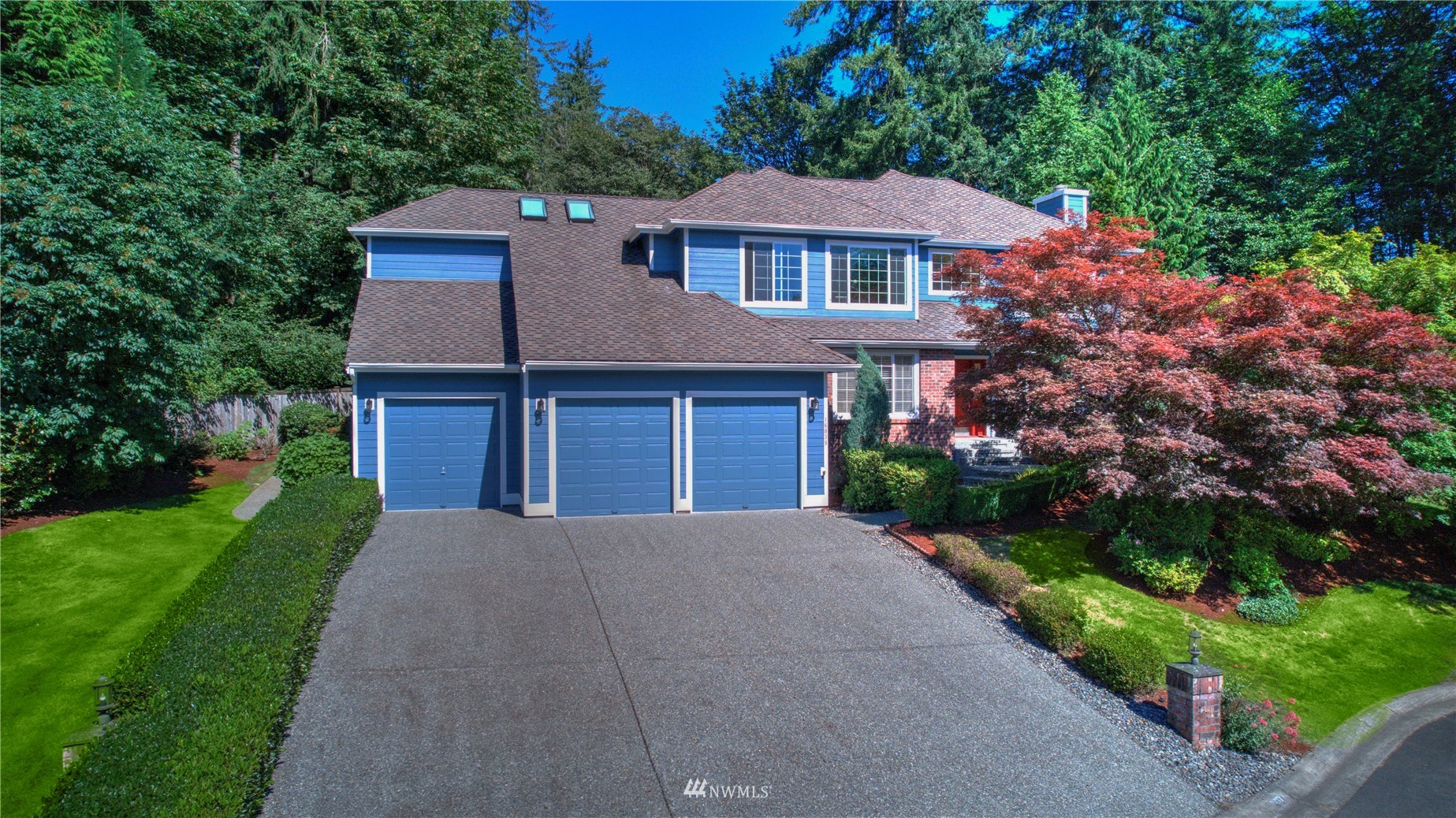 16038 Southeast 125th Street Renton, WA 98059 - Photo 1 of 34 a front view of a house with yard and green space
