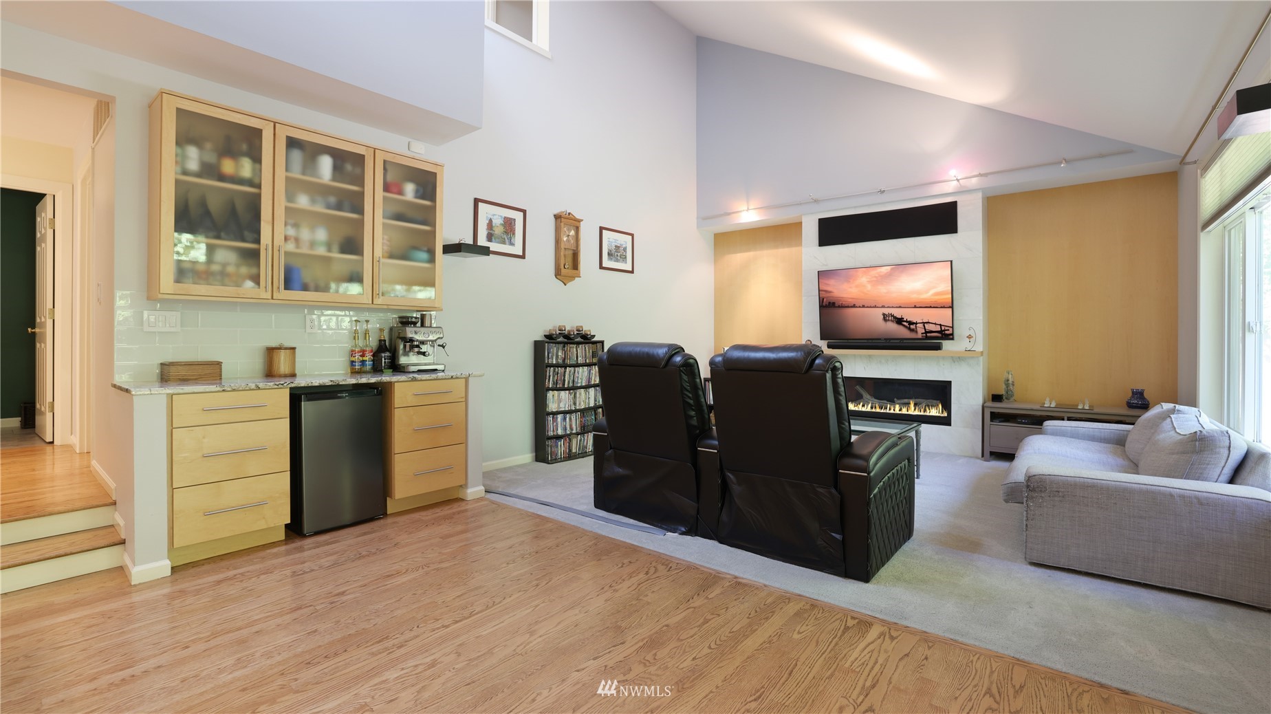 16038 Southeast 125th Street Renton, WA 98059 - Photo 19 of 34 a living room with furniture and a flat screen tv