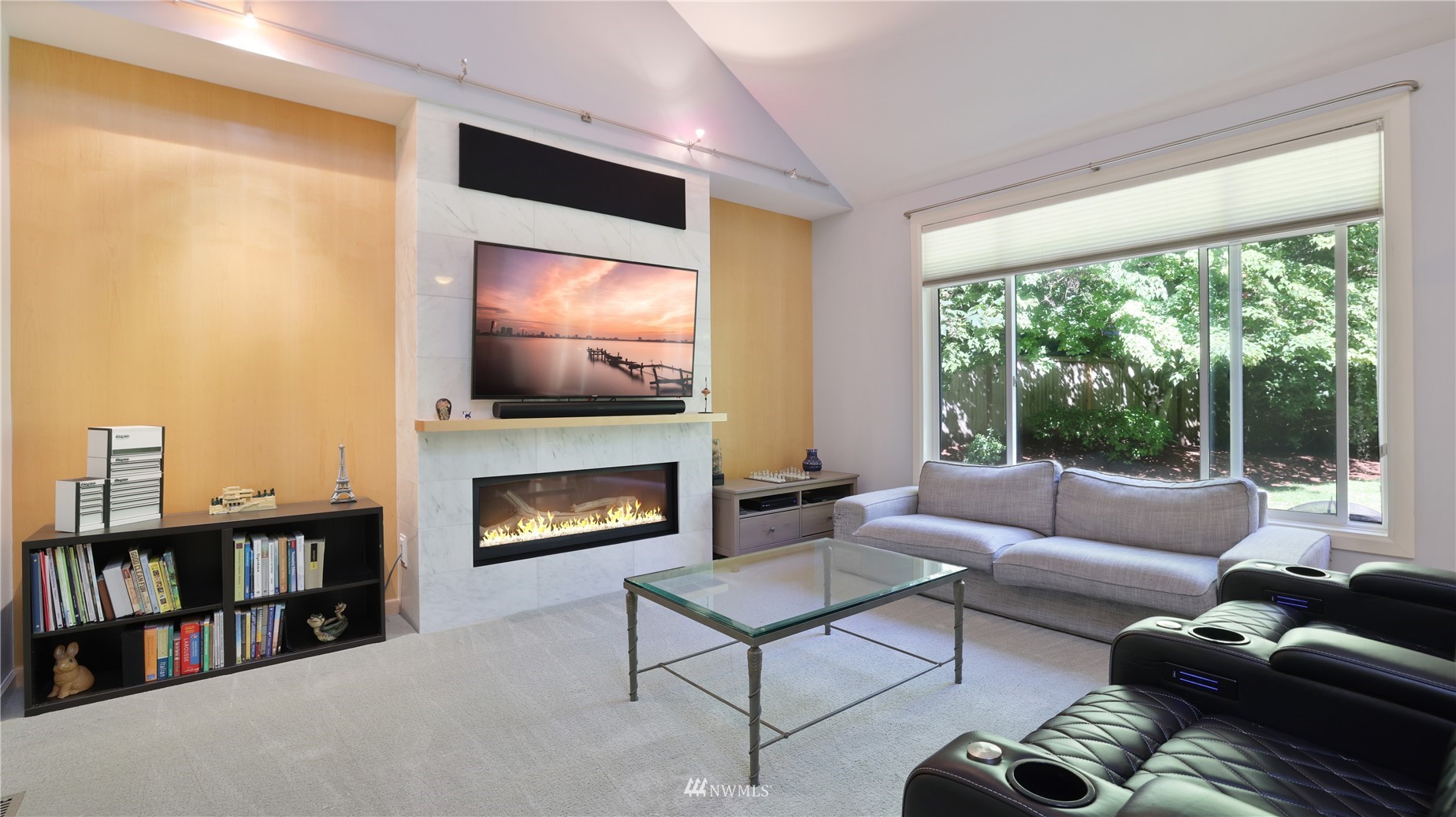 16038 Southeast 125th Street Renton, WA 98059 - Photo 20 of 34 a living room with furniture and a fireplace